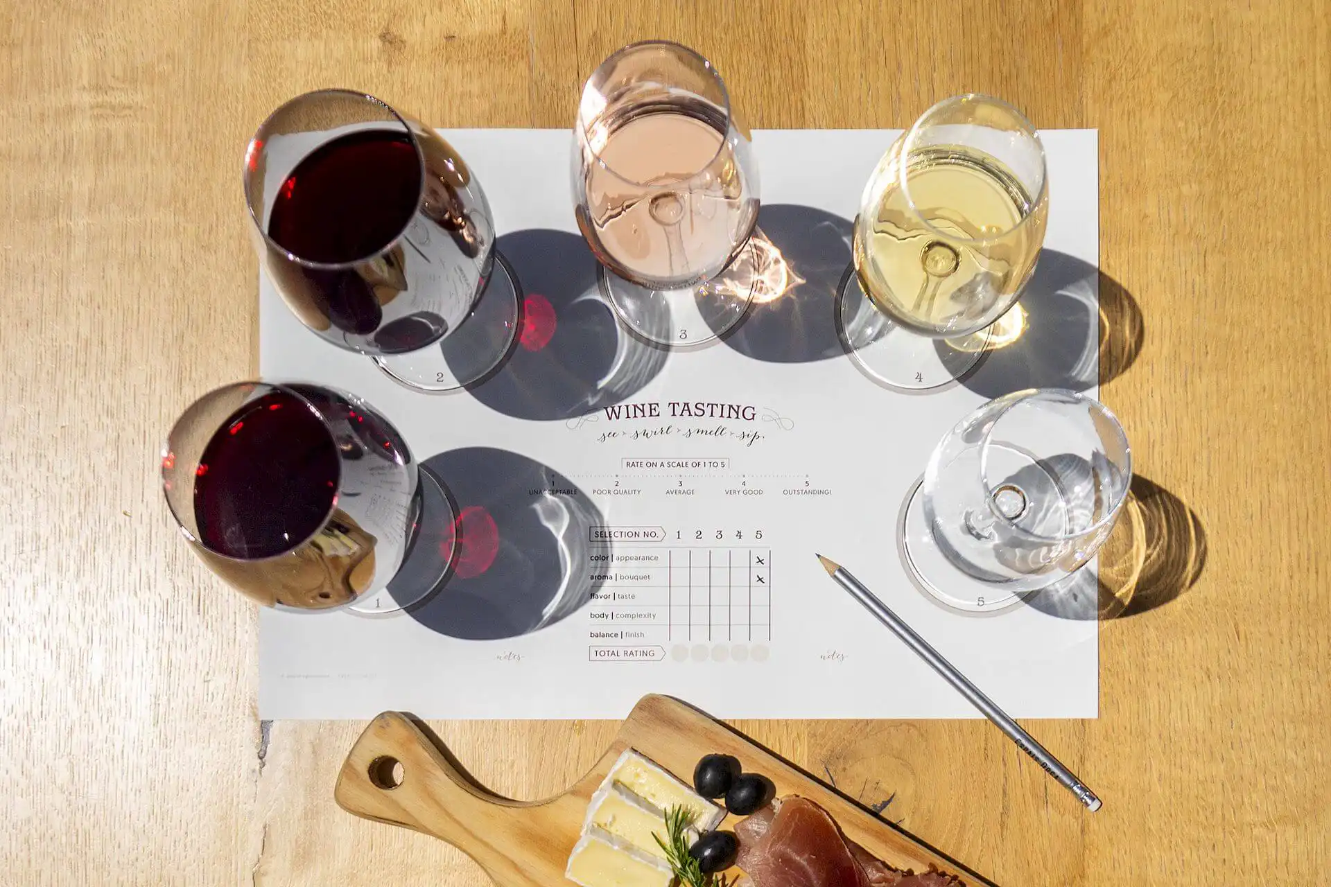 Portuguese wine tasting glasses with cheese and cured ham