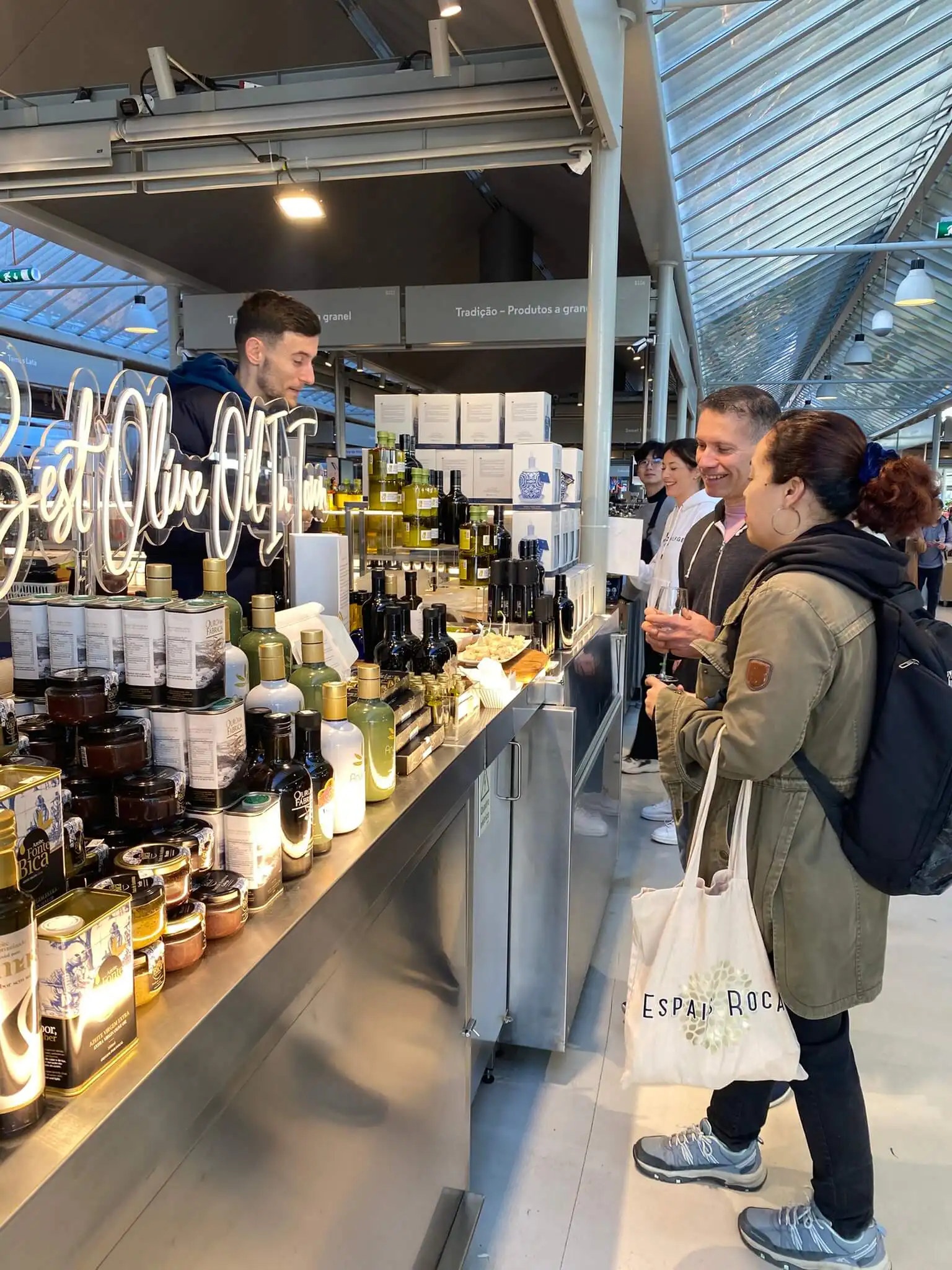Portuguese olive oil on a Porto market counter