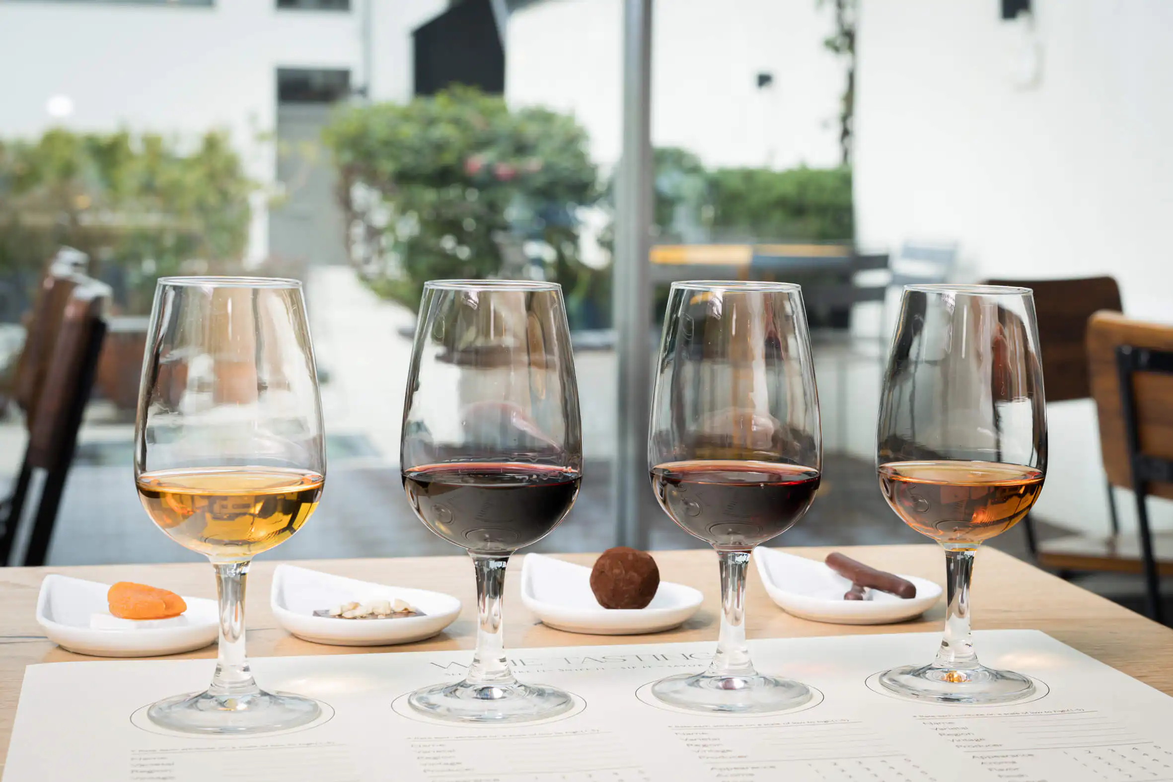 A Port tasting flight with chocolate and dried apricot pairings in Porto